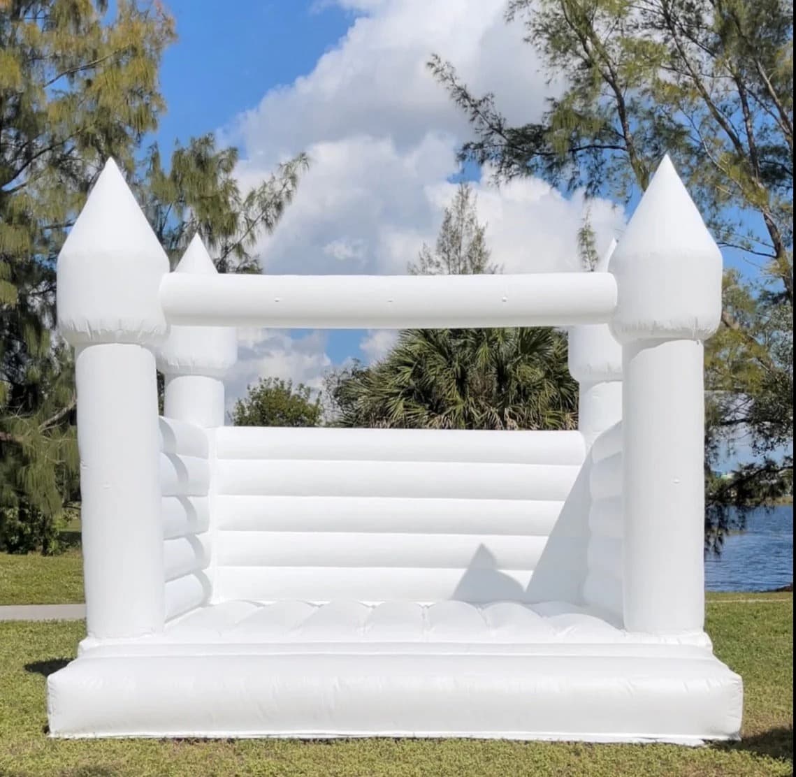 Luxury white castle bounce house rental in Miami