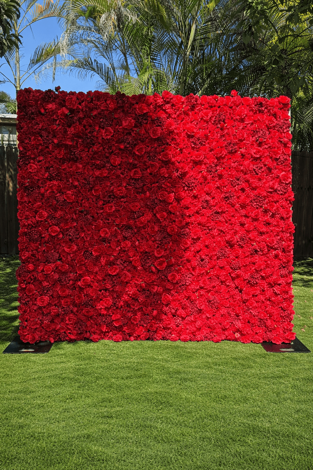 Red flower wall rental in Miami for luxury event backdrops